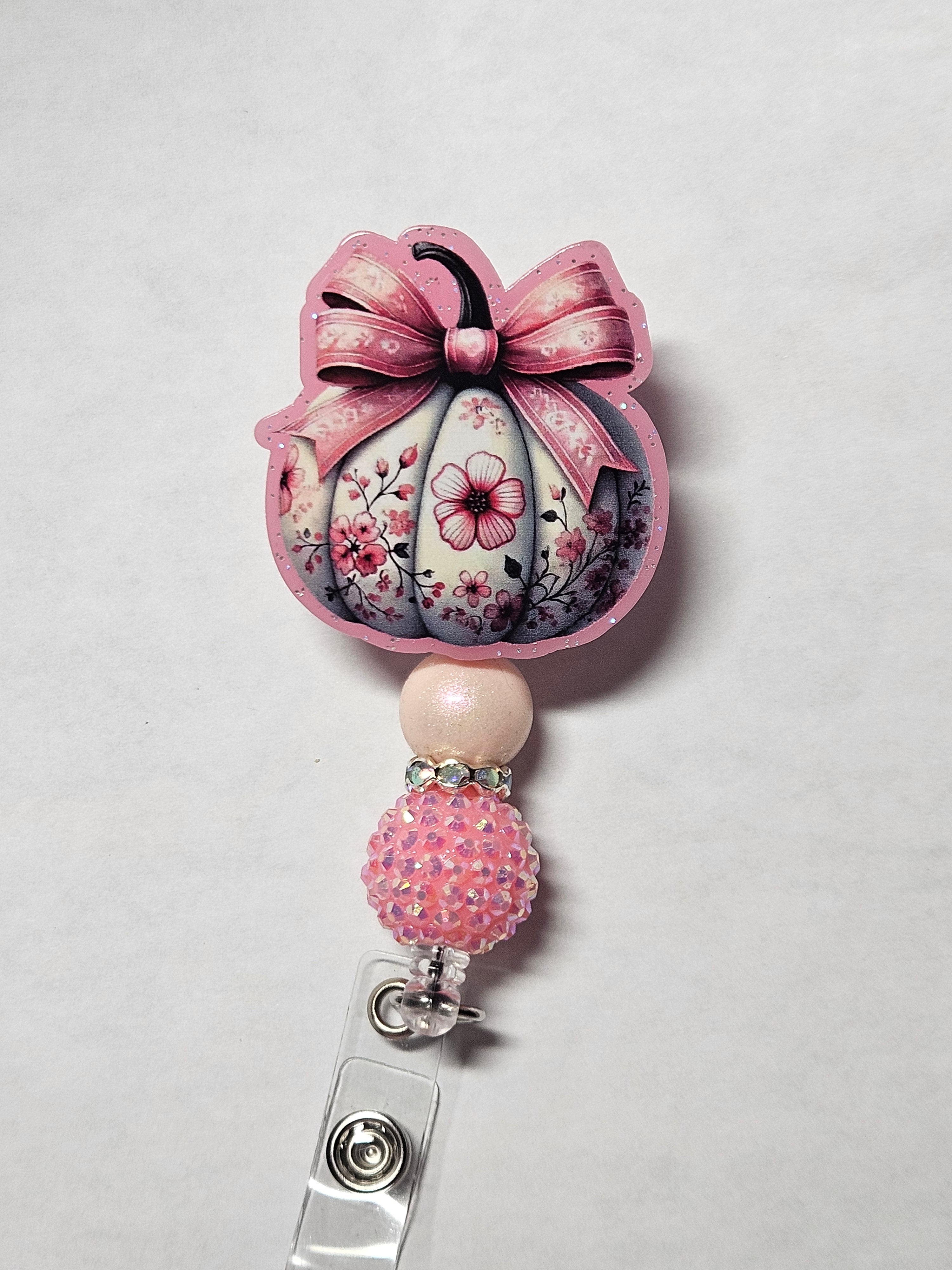 Badge reel pink flower pumpkin