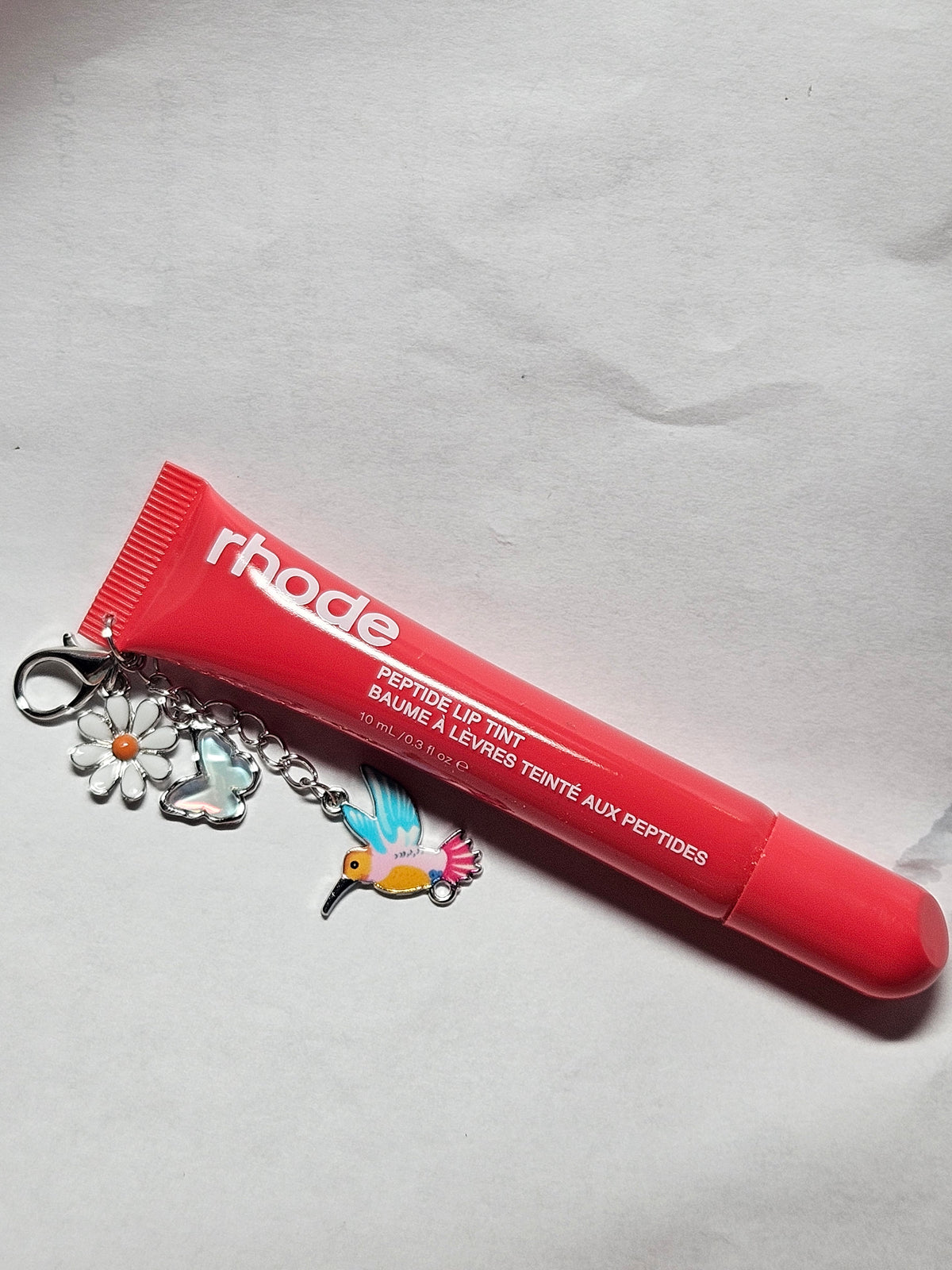 New rhode lip gloss guava spritz
