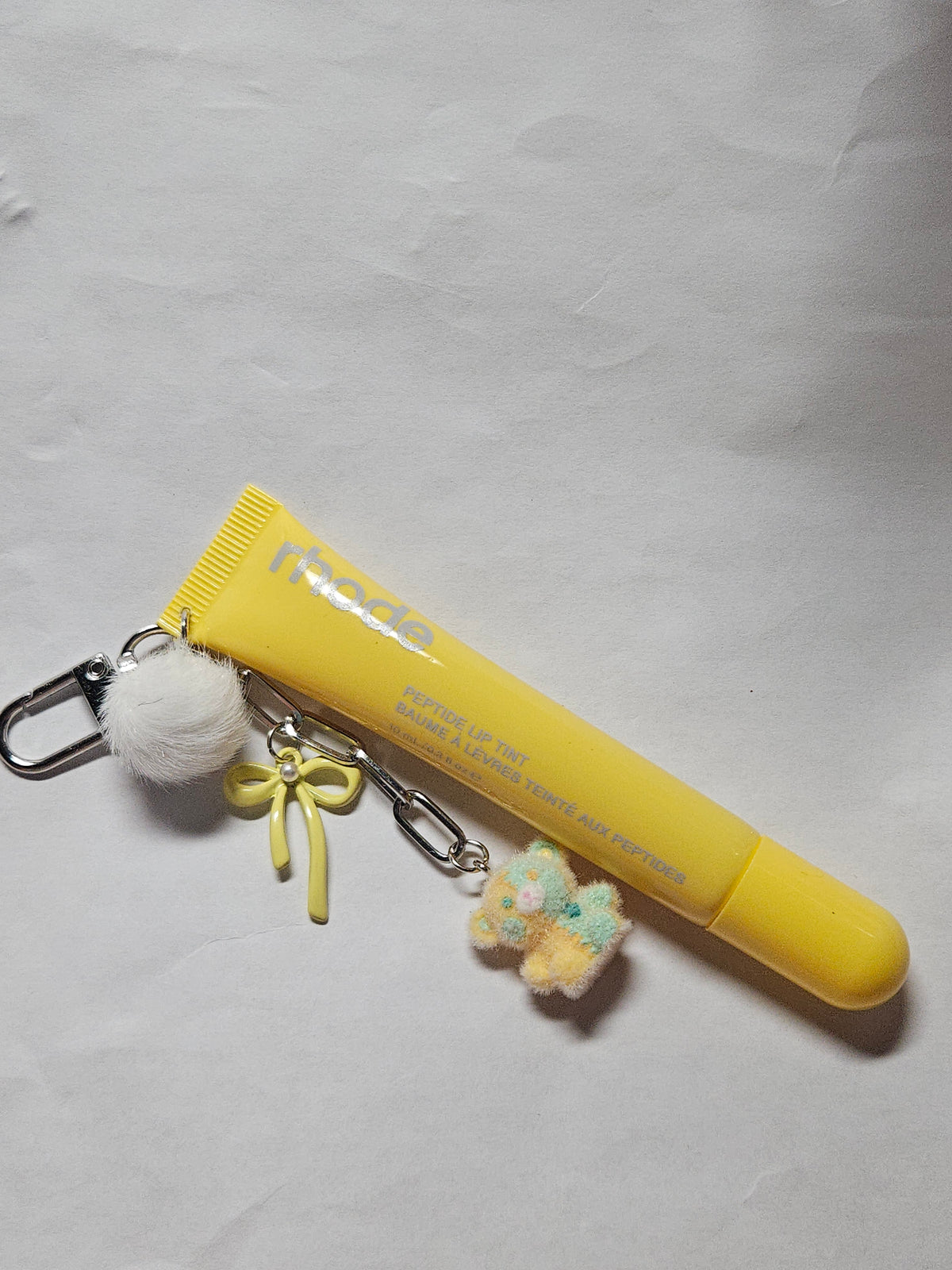 New rhode lip gloss lemontini