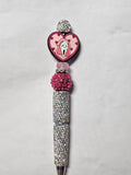 Beaded pink ghost face silver pen