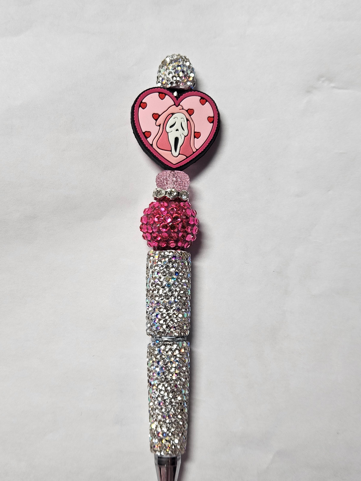 Beaded pink ghost face silver pen